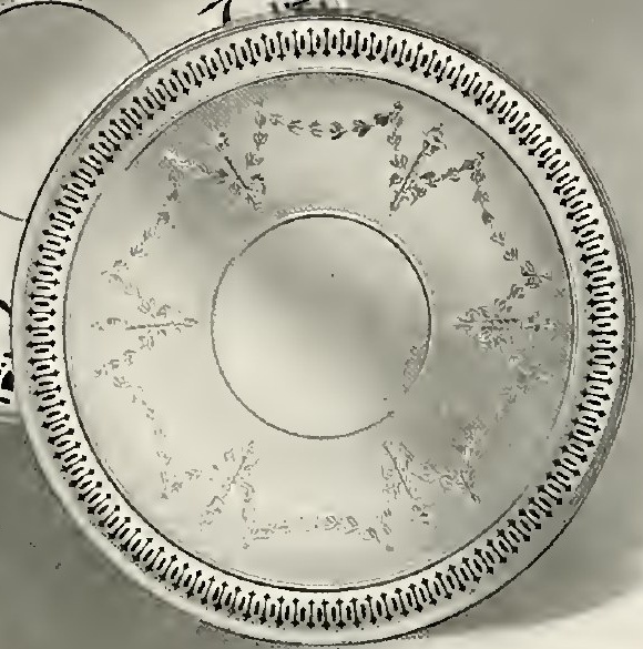 Catalog evidence for Basket / tray / serving ware · (1499 Piereed border; hand engraved.